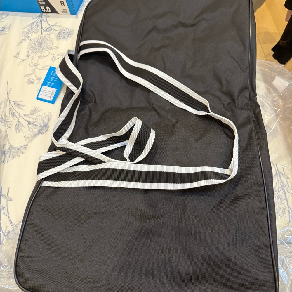 Black Hockey Bag with White Striped Strap, Bauer